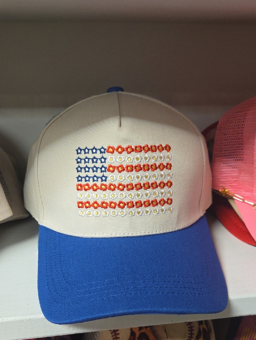 Cream and Blue Baseball Cap with Embroidered Floral Flag